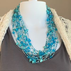 A pop of Turquoise in this beautiful, magnetic 12 strand of beads!!